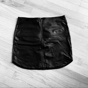 Vegan leather black mini skirt. Size 4.